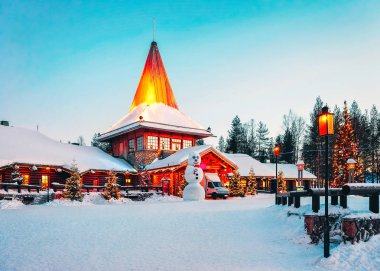 Snowman at Santa Office of Santa Claus Village in Rovaniemi in Lapland in Finland. clipart