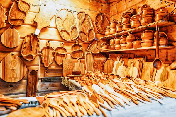 Wooden souvenirs at Christmas market in Riga in Latvia in winter.