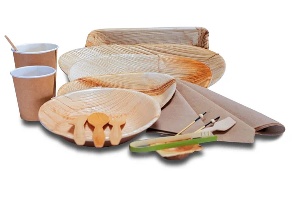 Set with wooden disposable tableware with plates and cutlery picnic — Stock Photo, Image