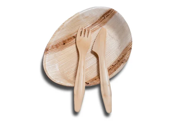 Wooden disposable tableware with plate and cutlery fork knife — Stock Photo, Image