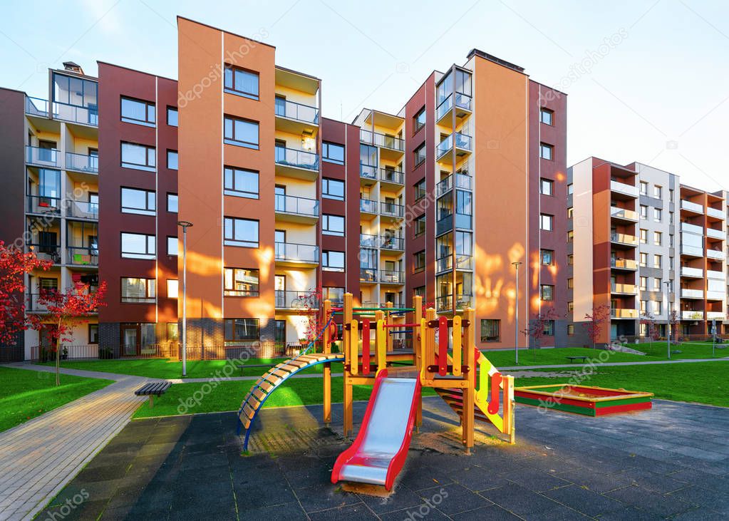 Apartment residential house facade architecture and kid playground