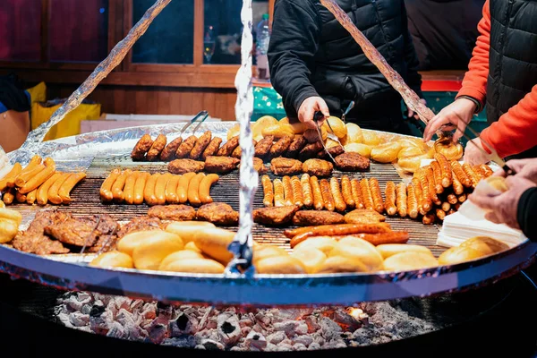 Traditional BBQ barbeque wurst sausages on Christmas market Berl — Stock Photo, Image