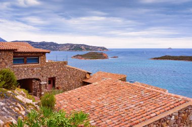 Capo Coda Cavallo üzerinde Ev ve yazlık ile Sahne