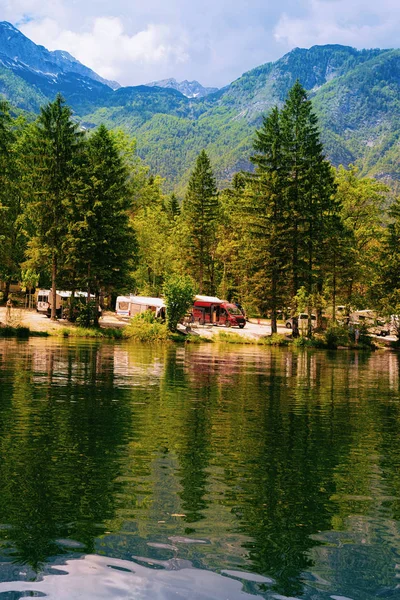 Camping of RV caravan trailers at Bohinj Lake Slovenia