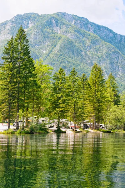 Camping of RV caravan trailers at Bohinj Lake in Slovenia