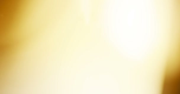 lumière dorée abstraite impulsions et lueurs lumières fuites effet mouvement arrière-plan, teinte chaude 