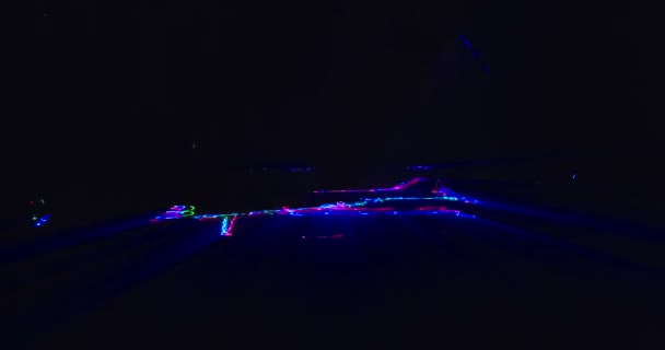 lumières laser abstraites tournant en esagonal concentrique, spectre psychédélique arc-en-ciel de couleurs violettes, danse disco et fond de musique électronique, boucle transparente 