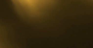 Soyut altın ışık titreşimleri ve parlayan ışıklar hareket arka planı, sıcak