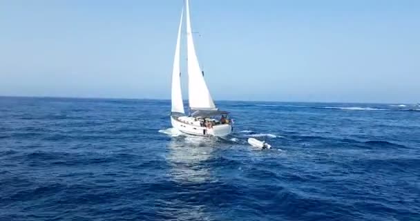 Famous, beautiful beach at daylight with calm sea, in summer very popular, fantastic view of island of ibiza with vessels in — Stock Video