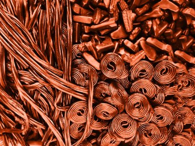 Siyah veya kahverengi şeker spiral arka plan. Meyan Kökü Tekerlekler Şekerler. Koyu Jöle Aromalı Meyan Kökü.