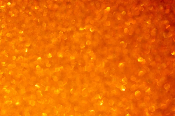 Orange i złota streszczenie światła bokeh. tło niewyraźne — Zdjęcie stockowe