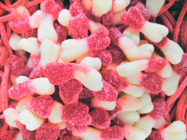 Σκουλήκια, τζουτζιλίκια, γλυκά. Καραμελίτσες με ζάχαρη. Φόντο ή υφή μαρμελάδα γλυκά. — Φωτογραφία Αρχείου
