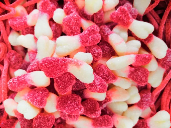 Wormen, jujube, snoep. Gummy suiker snoepjes. Achtergrond of textuur Top View Jelly Sweets. — Stockfoto