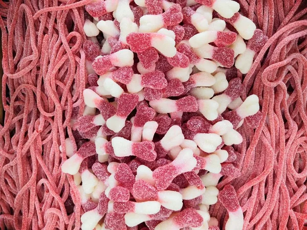 Worms, Jujube, édességek. Nyúm cukor cukorka. Háttér vagy a textúra felülnézet Jelly édességek. — Stock Fotó