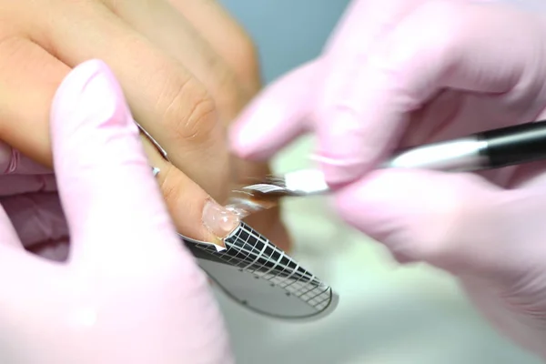 Çivi şablonu. Güzellik uzmanına tırnak yapıyorum. Yapay tırnaklar, manikürler, yapay tırnak düzeltmeleri yap,