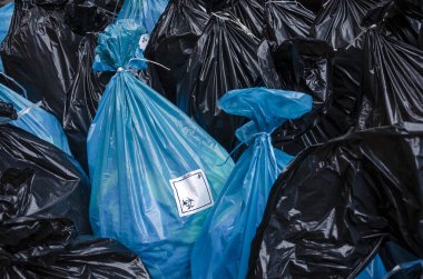 Biohazard waste bags with sticker logo, hospital waste clipart
