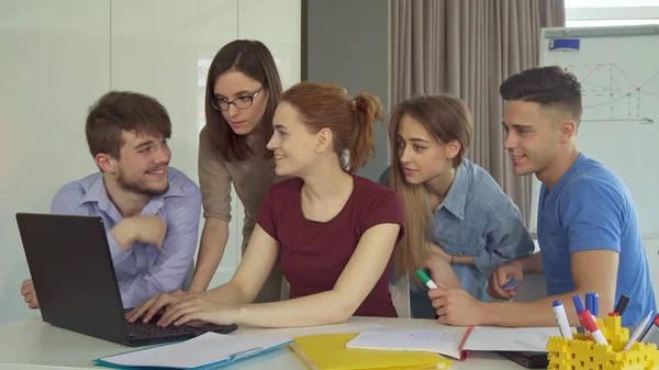 Group of young people works at the office — Stock Photo, Image