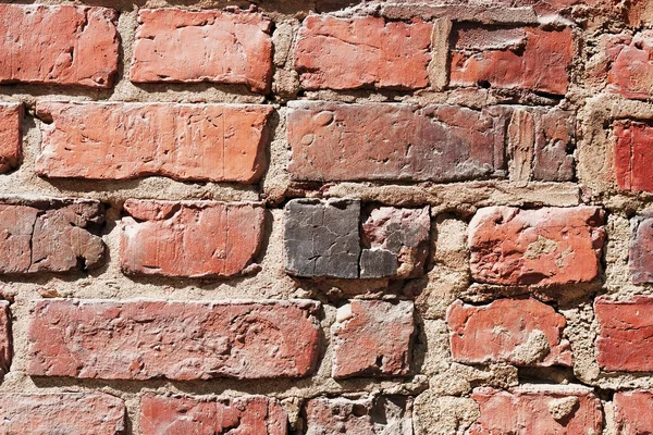 Фрагмент грубой кирпичной стены — стоковое фото