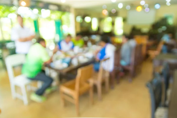 Blur Abstract Background of People or Asian men Business Meeting in Restaurant or Coffee Shop as Modern Business Lifestyle Brainstorming and Cooperative