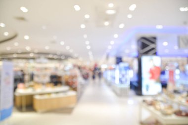 İnsanların alışveriş yaptığı soyut bulanıklık ve Işık Bokeh Arkaplan resmi