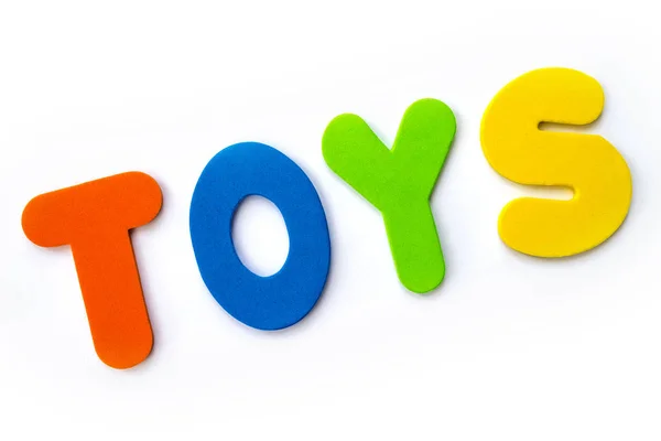 Het Woord Speelgoed Met Gekleurde Letters Aangegeven — Stockfoto