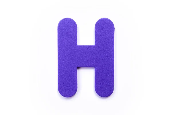 白色背景上的紫色字母 — 图库照片