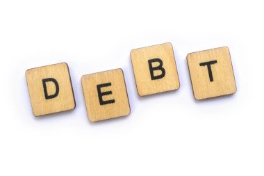 Borç, word spelt ahşap mektup taşlarla.