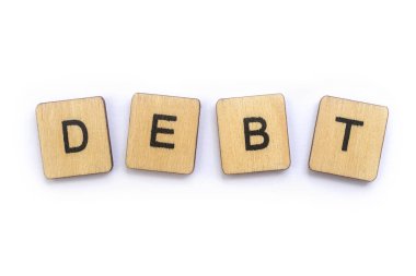 Borç, word spelt ahşap mektup taşlarla.