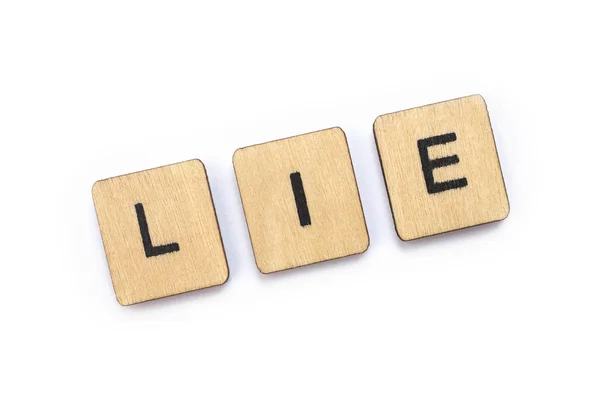 Das Wort Lüge Geschrieben Mit Hölzernen Buchstabenkacheln — Stockfoto