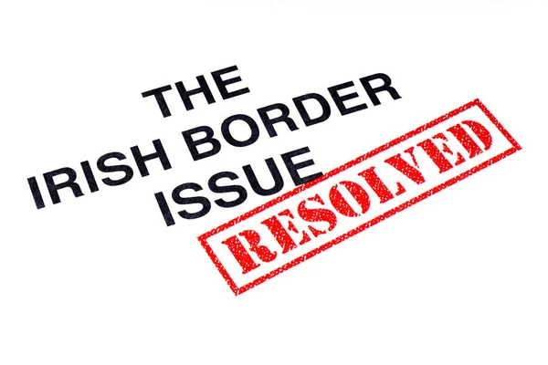 赤解決済みのスタンプがスタンプされてアイルランドの国境問題ヘッドライン — ストック写真