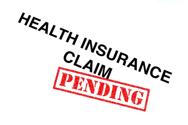 Health Insurance Claim Heading Stamped Red Pending Rubber Stamp — Stock Photo, Image