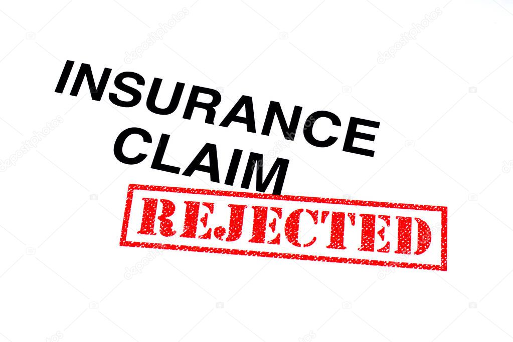 Insurance Claim heading stamped with a red REJECTED rubber stamp.