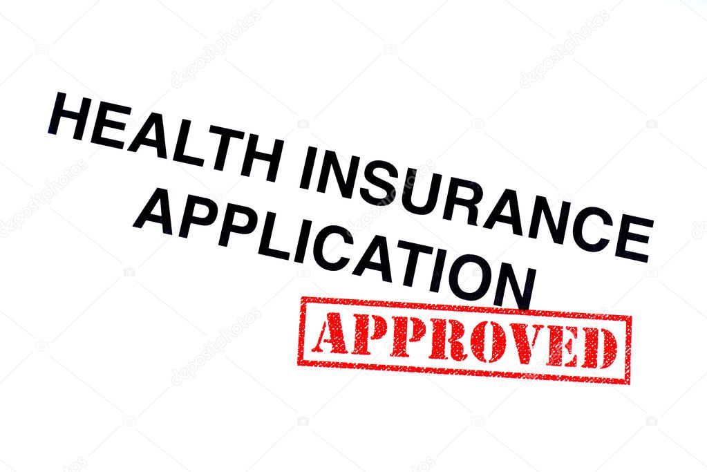 Health Insurance Application heading stamped with a red APPROVED rubber stamp.
