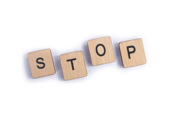 Word Stop Spelt Wooden Letter Tiles — Stock Photo, Image