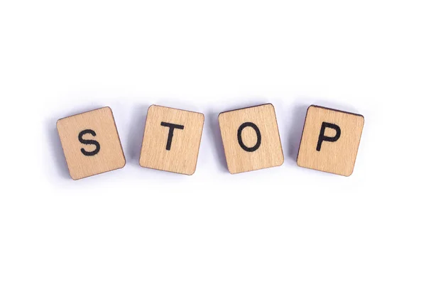 Word Stop Spelt Wooden Letter Tiles — Stock Photo, Image