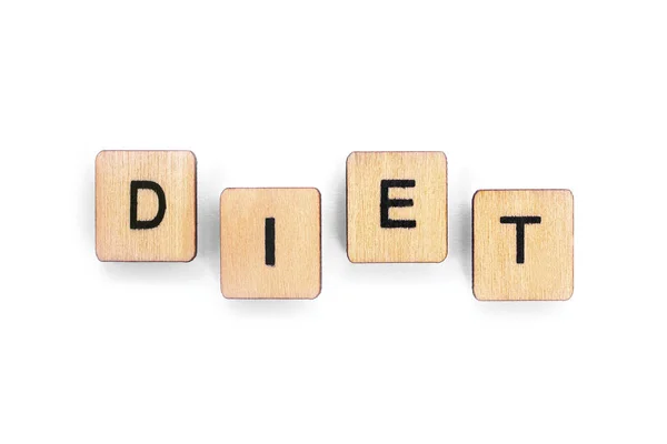 Das Wort Diät Geschrieben Mit Hölzernen Buchstabenkacheln Vor Weißem Hintergrund — Stockfoto
