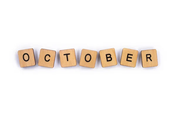 October Spelt Wooden Letter Tiles Plain White Background — Stock Photo, Image