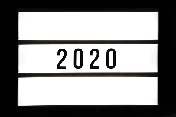 2020 Metinde Bir Siyah Arka Plan Üzerinde Izole Bir Işık — Stok fotoğraf
