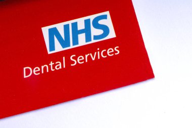 London, UK - November 14th 2018: A close-up of the NHS - National Health Service logo, pictured on an information leaflet about their Dental Services. clipart