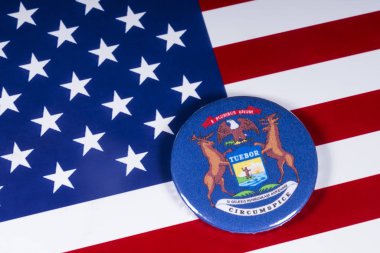 Londra, İngiltere - 20th Kasım 2018: Devlet Michigan, Amerika Birleşik Devletleri bayrağı üzerinde resimde sembolü.