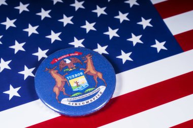 Londra, İngiltere - 20th Kasım 2018: Devlet Michigan, Amerika Birleşik Devletleri bayrağı üzerinde resimde sembolü.