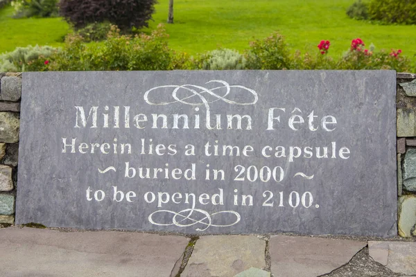 A plaque in the village of Sneem in County Kerry, Ireland, marking where a time capsule was buried during the Millennium celebrations in 2000.  The capsule will be opened in 2100.