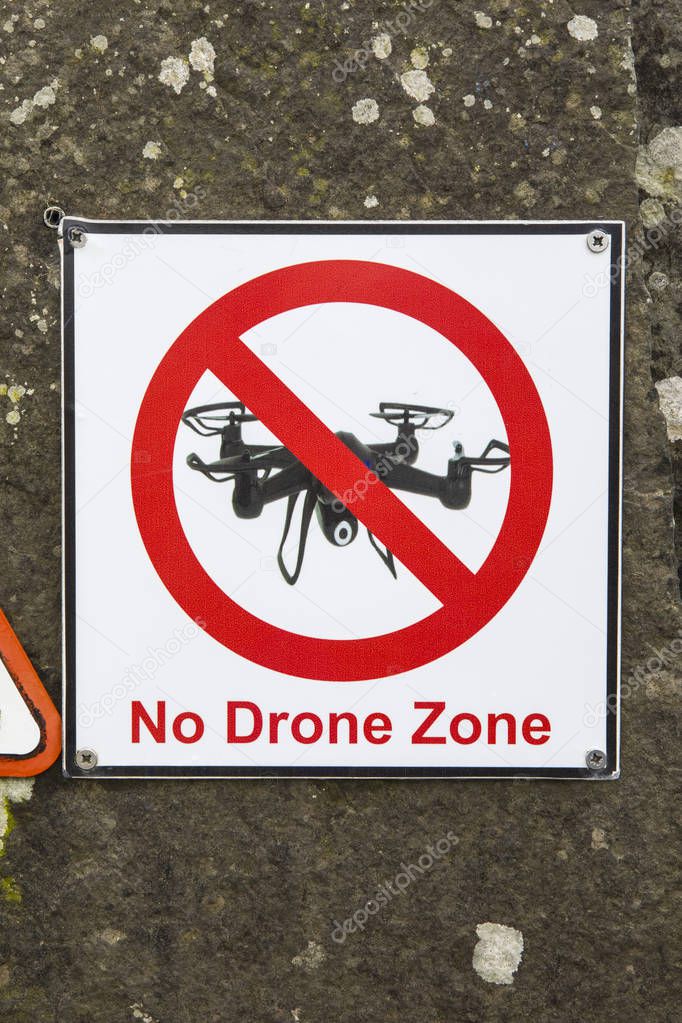A sign telling visitors the area is a No Drone Zone at the Cliffs of Moher in Ireland. 