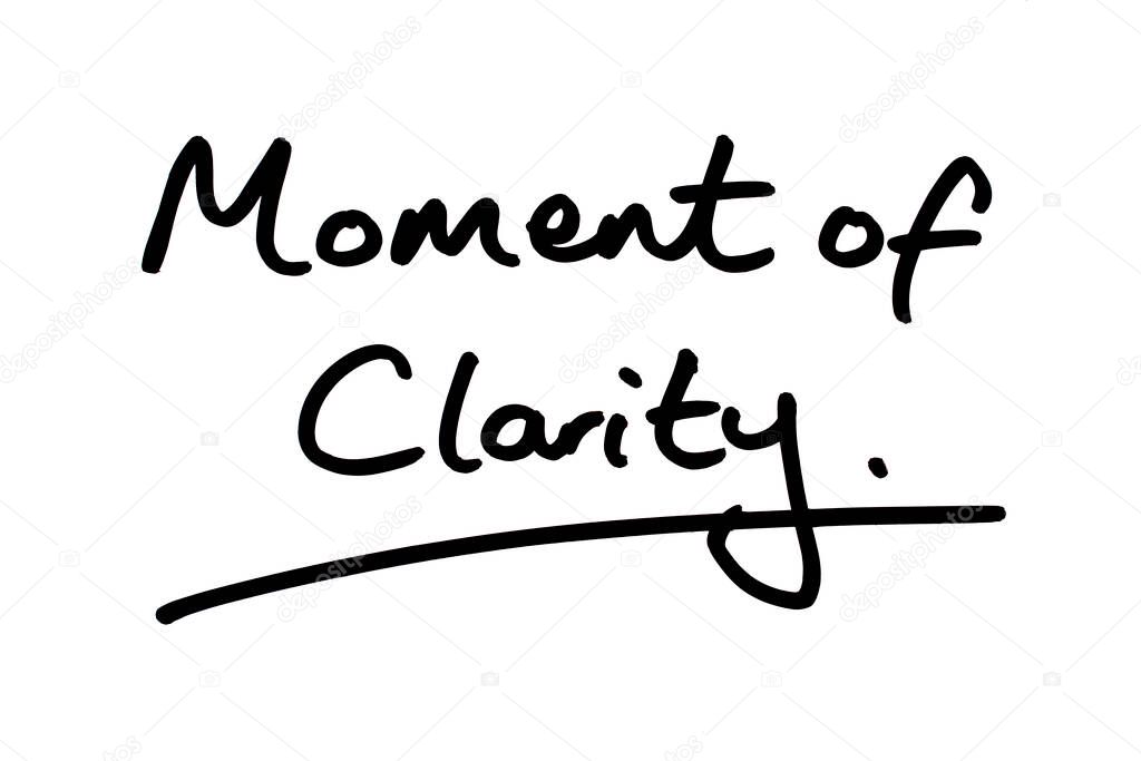 Moment of Clarity handwritten on a white background.