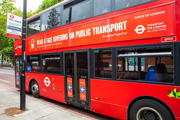 London June 17Th 2020 Red London Bus Displaying Government Advice — Stock Photo, Image