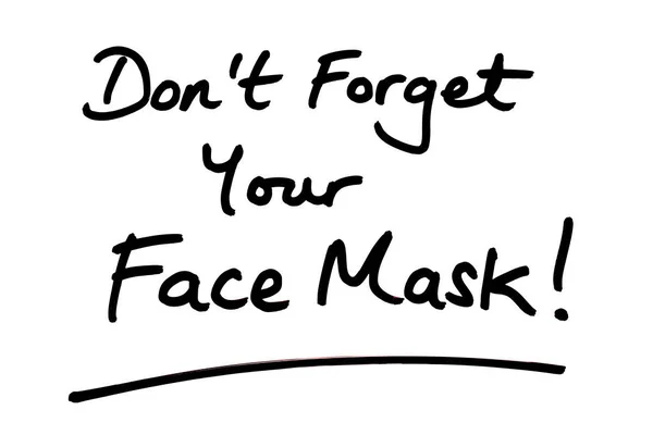 不要忘记你的面具 白底手写的 — 图库照片