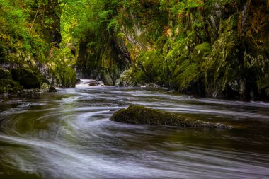 A view of the stunning Fairy Glen in the village of Betws-y-Coed in North Wales, UK. clipart