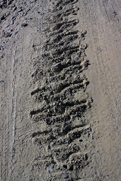 Pista de um trator de esteiras — Fotografia de Stock