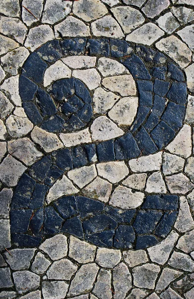 Portuguese sidewalk of calcada in the form of the number 2