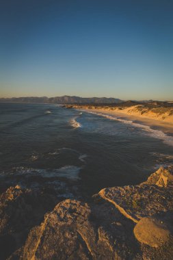 Geniş açı panoramik walker bay doğaya rezerv Güney Afrika'da overberg kıyı şeridi boyunca